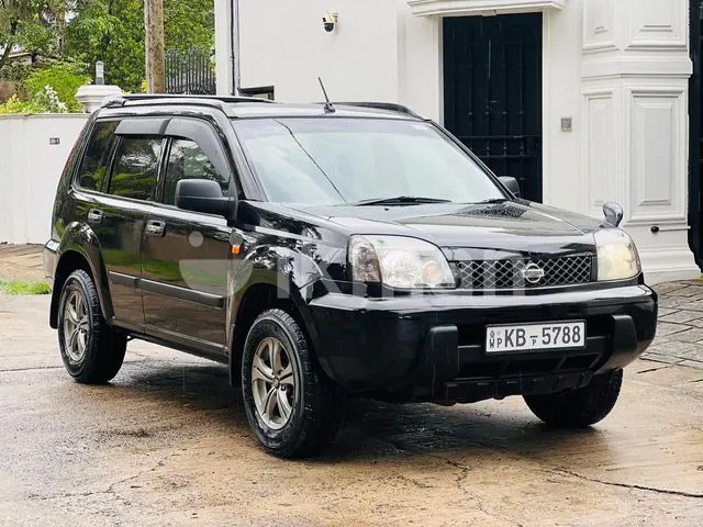 Nissan X-Trail 2003 photo 2