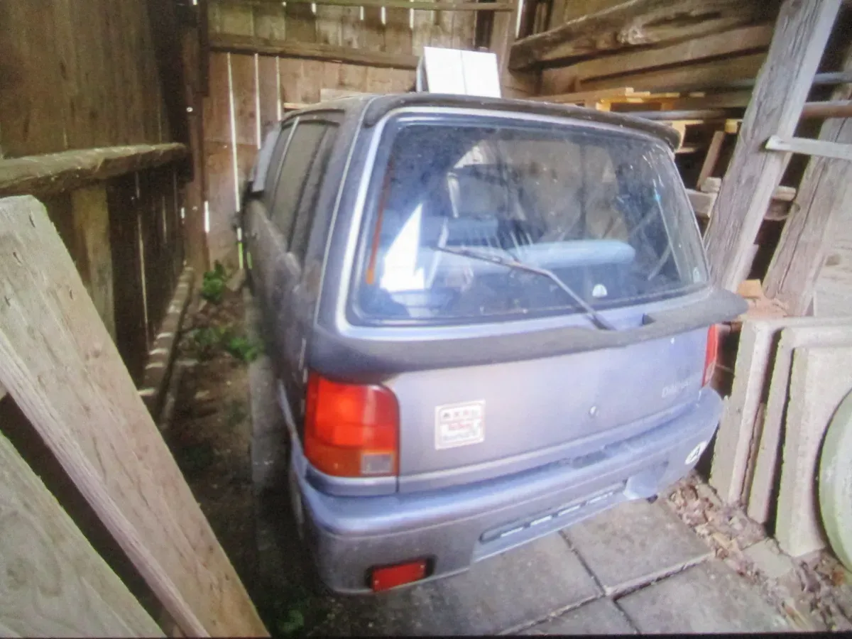 Daihatsu Cuore 1995 photo 2