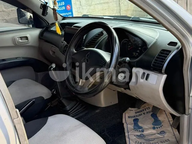 Mitsubishi L200 2011 photo 3