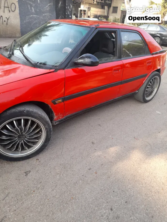 Mazda 323 1992 photo 4