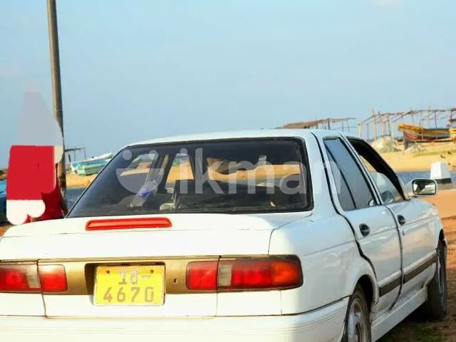 Nissan Sunny 1990 photo 4
