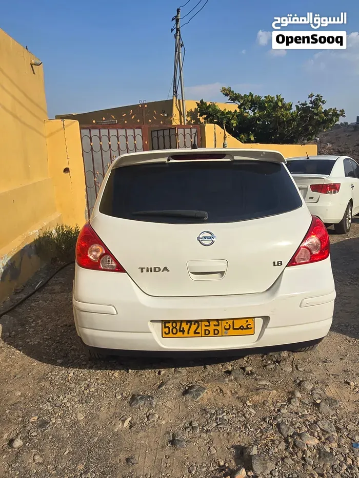Nissan Tiida 2013 photo 2