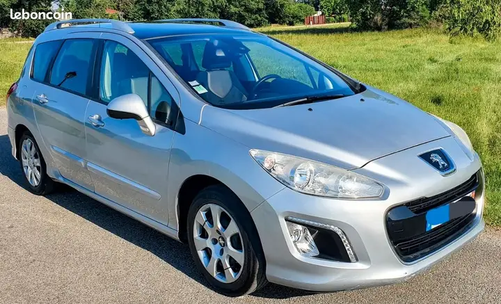 Peugeot 308 2012 photo 2