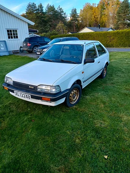 Mazda 323 1988 photo 2