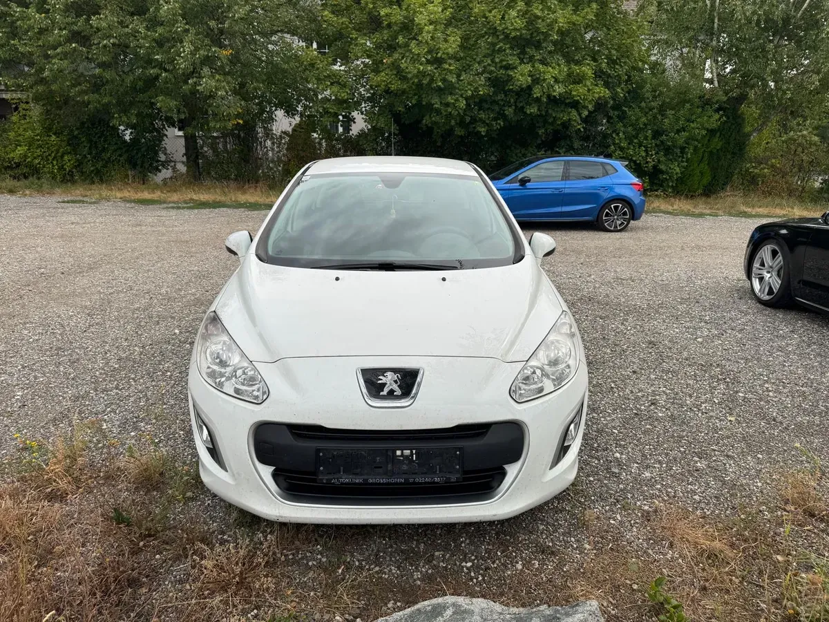 Peugeot 308 2012 photo 2