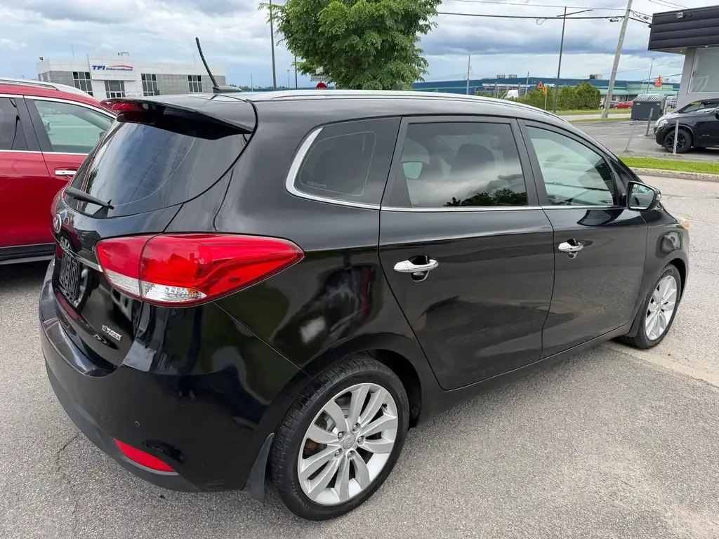 Kia Rondo 2014 photo 4
