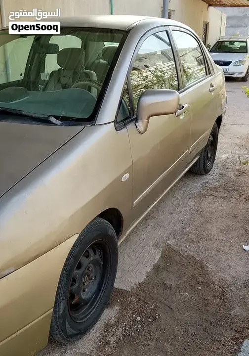 Suzuki Liana 2005 photo 2