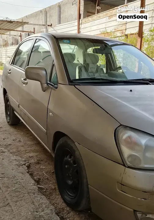 Suzuki Liana 2005 photo 3