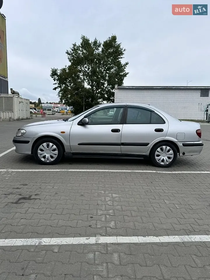 Nissan Almera 2002 photo 2