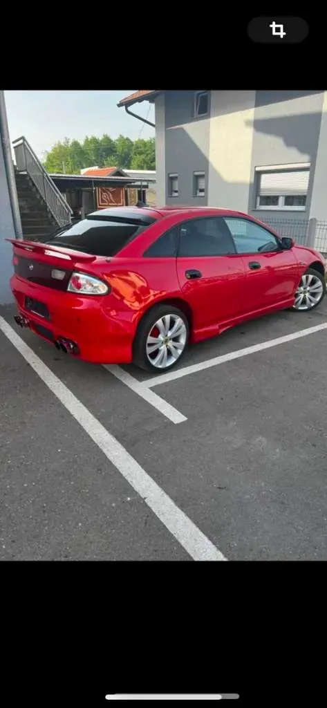 Mazda 323 1997 photo 2