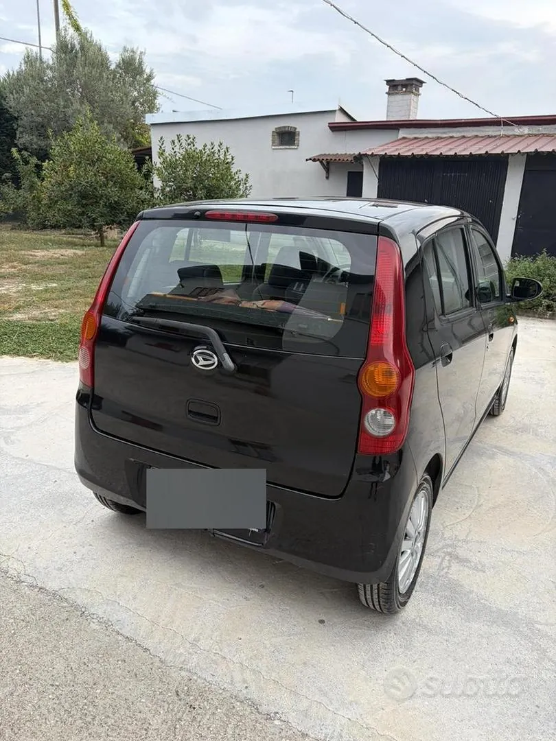 Daihatsu Cuore 2007 photo 5