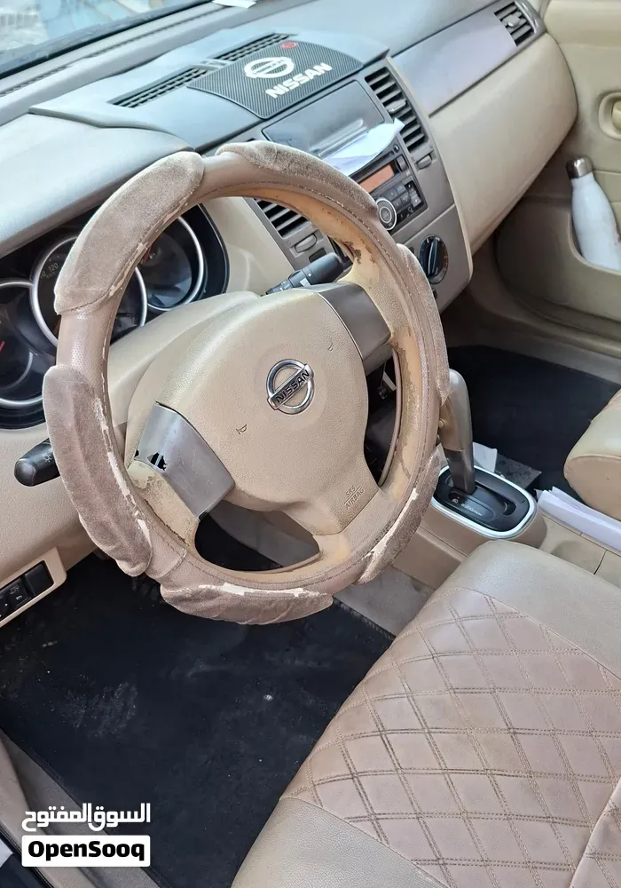 Nissan Tiida 2012 photo 2