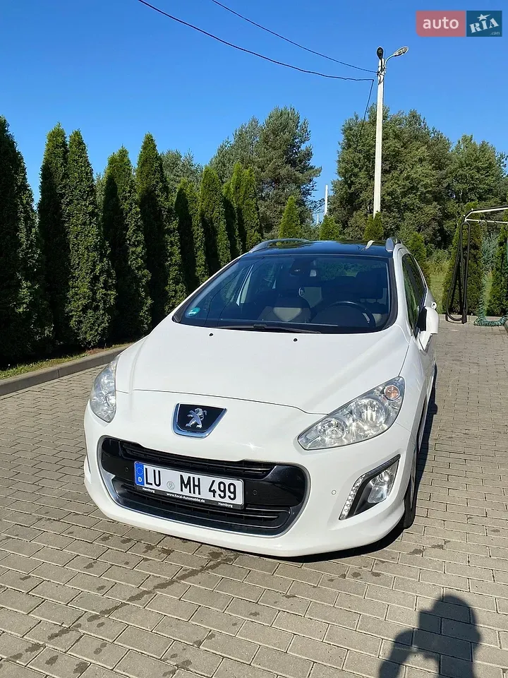 Peugeot 308 2012 photo 3