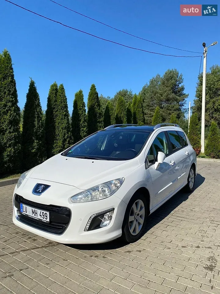 Peugeot 308 2012 photo 2