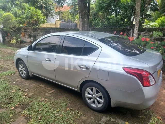 Nissan Sunny 2013 photo 4