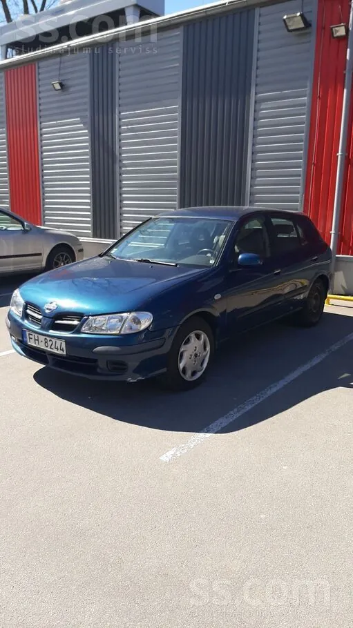 Nissan Almera 2000 photo 2