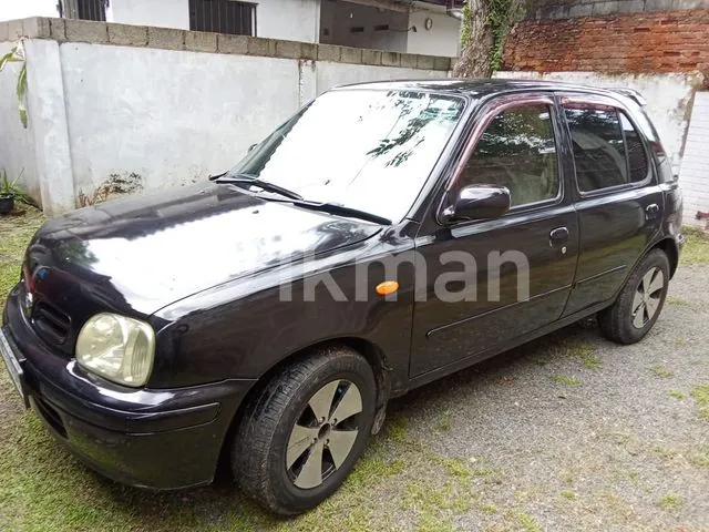 Nissan March 1998 photo 3