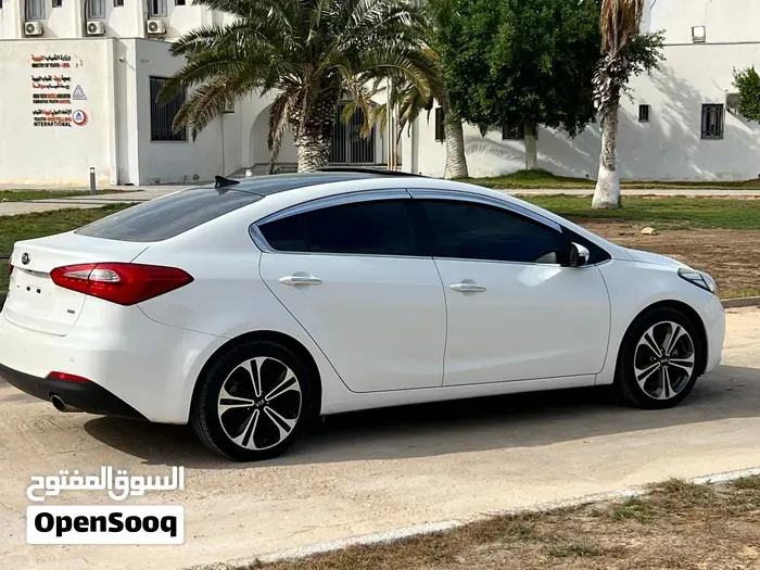 Kia K3 2014 photo 4