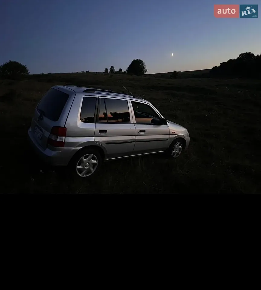 Mazda Demio 2001 photo 4