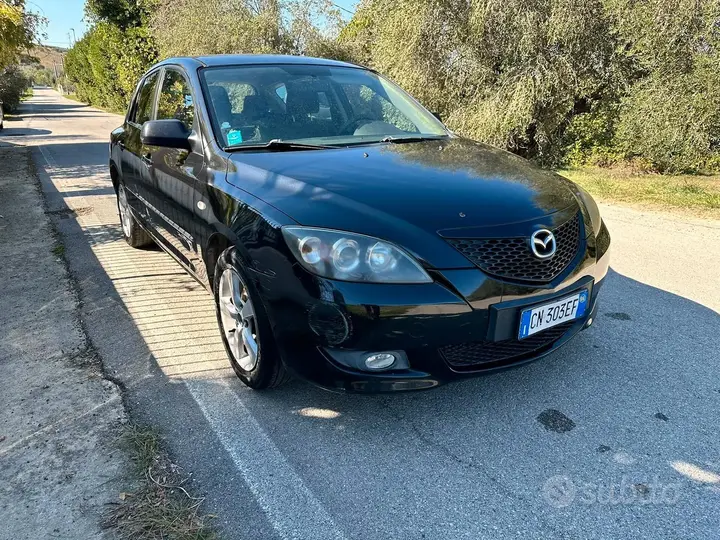 Mazda Mazda3 2004 photo 2