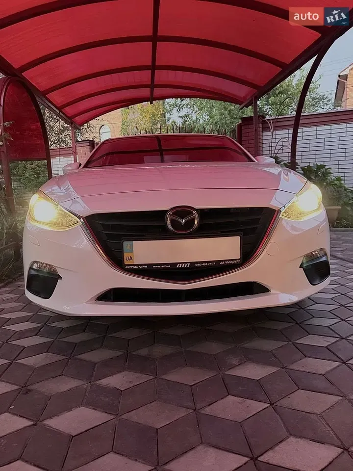 Mazda 3 2014 photo 2