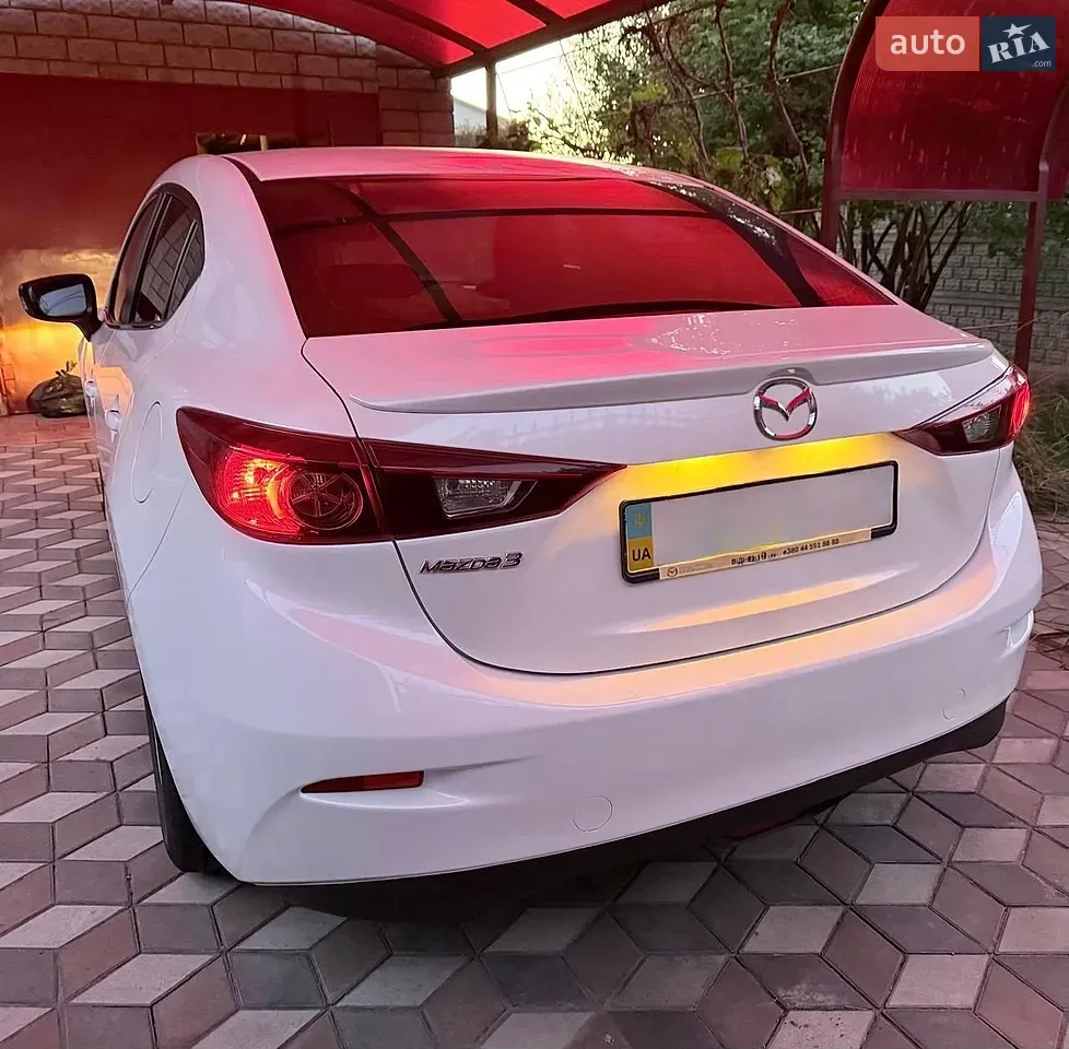 Mazda 3 2014 photo 3