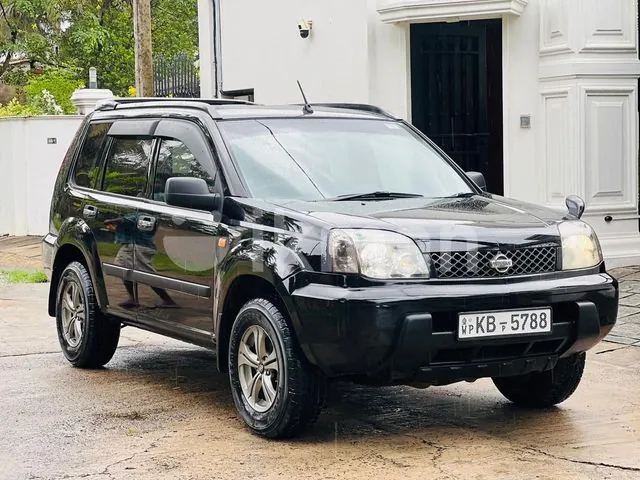 Nissan X-Trail 2004 photo 2