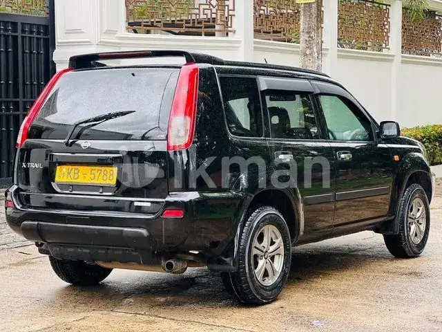 Nissan X-Trail 2004 photo 2