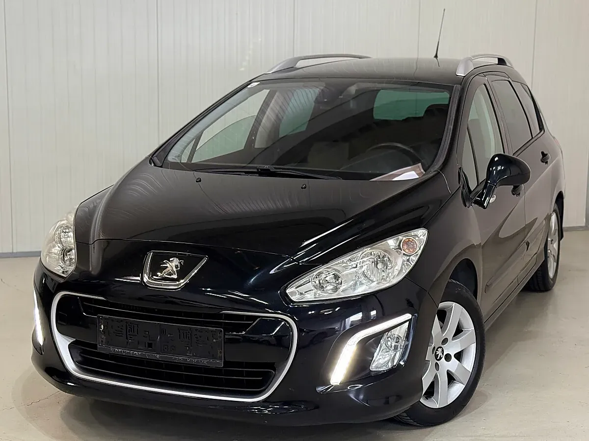 Peugeot 308 2013 photo 2