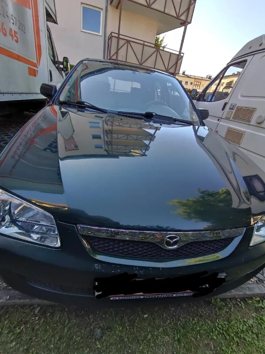 Mazda 323 2000 photo 2