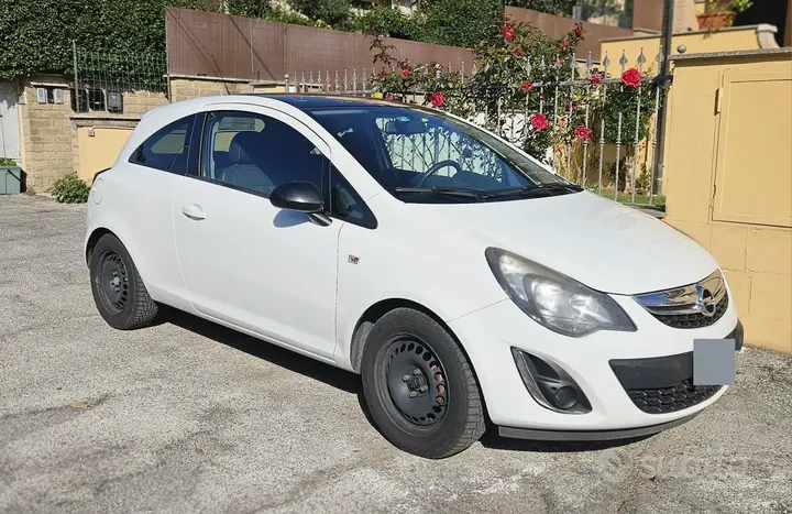 Opel Corsa D 2013 photo 2