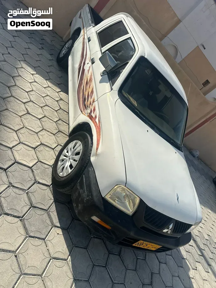Mitsubishi L200 2006 photo 2