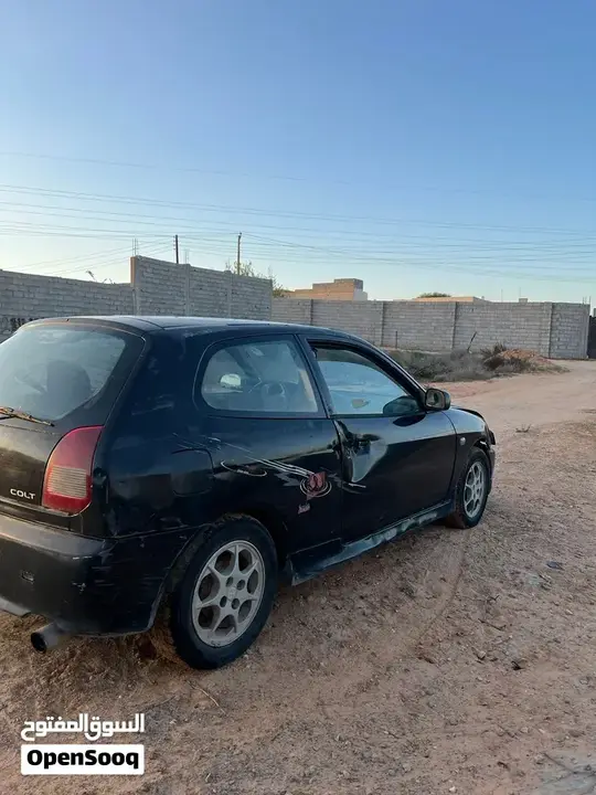Mitsubishi Colt 2001 photo 2