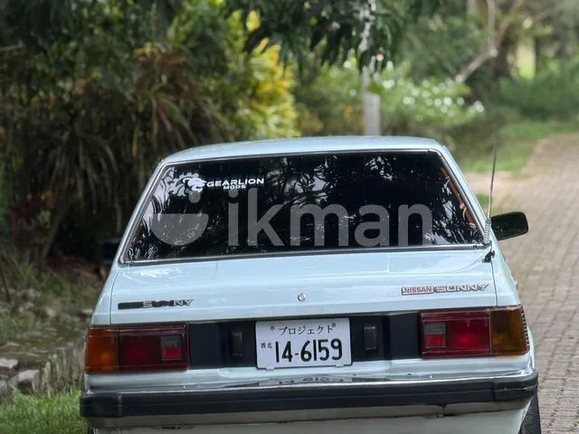 Nissan B11 1985 photo 3