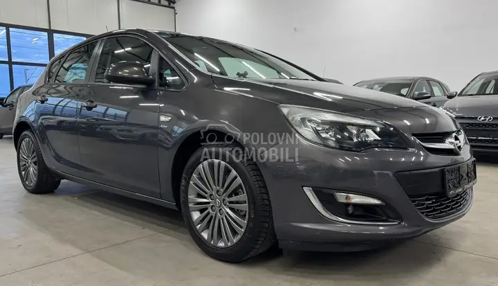 Opel Astra J 2013 photo 5