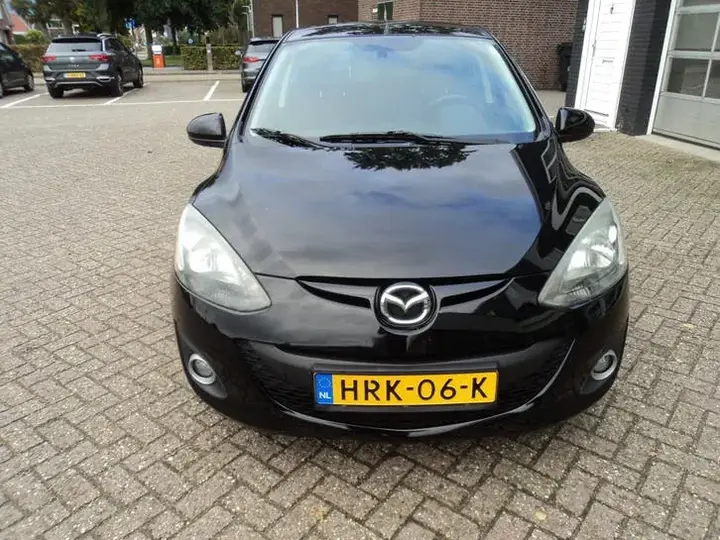 Mazda 2 2013 photo 2