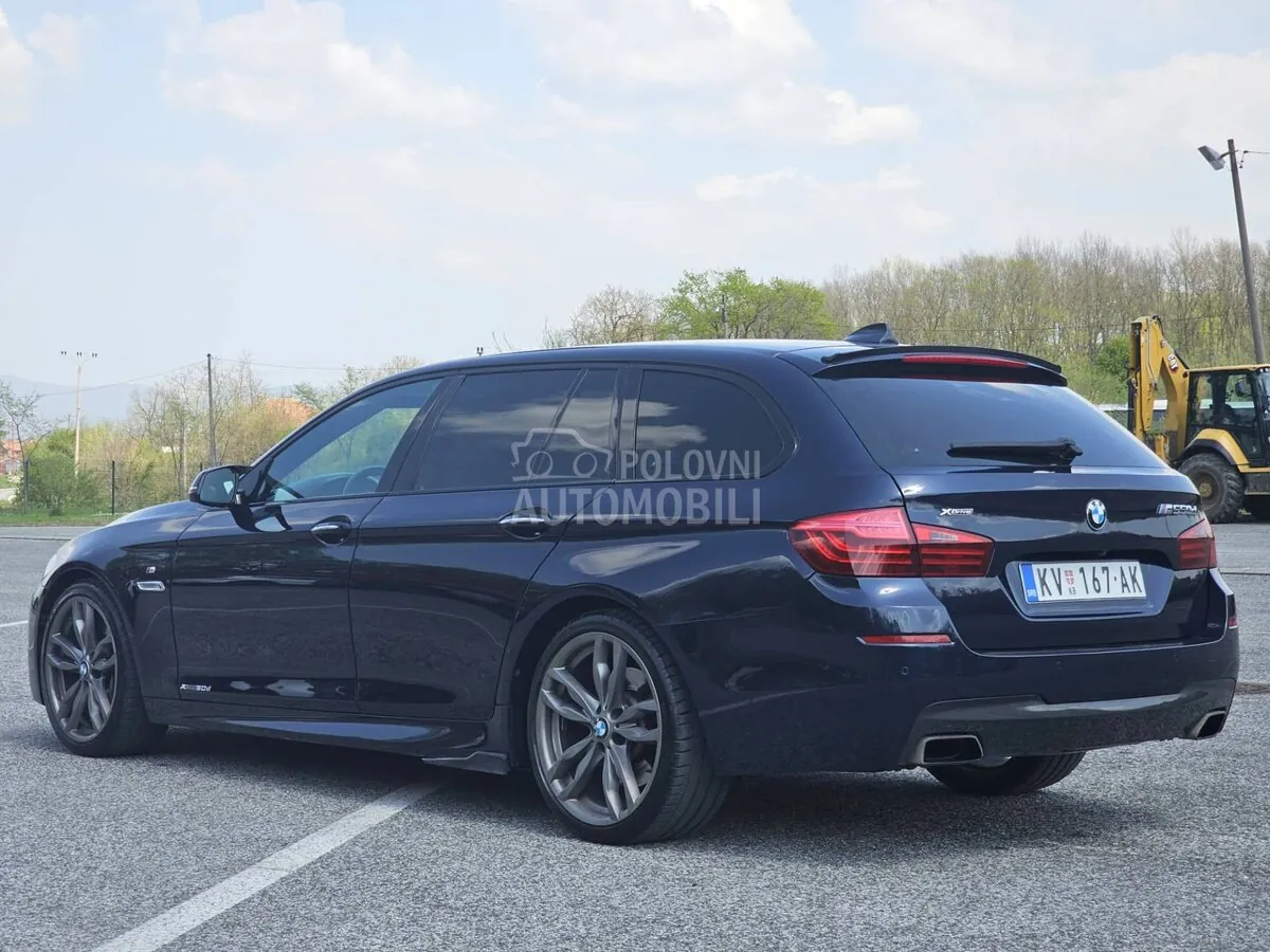 BMW M550 2014 photo 4