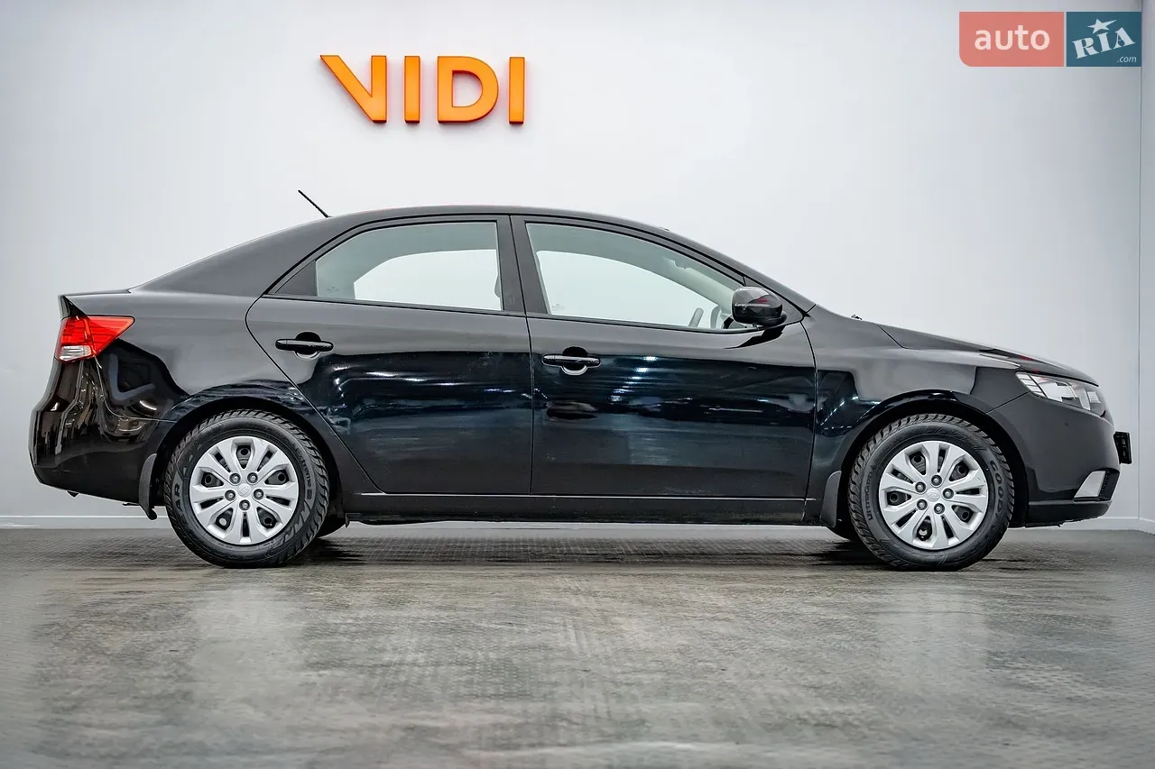 Kia Cerato 2011 photo 4