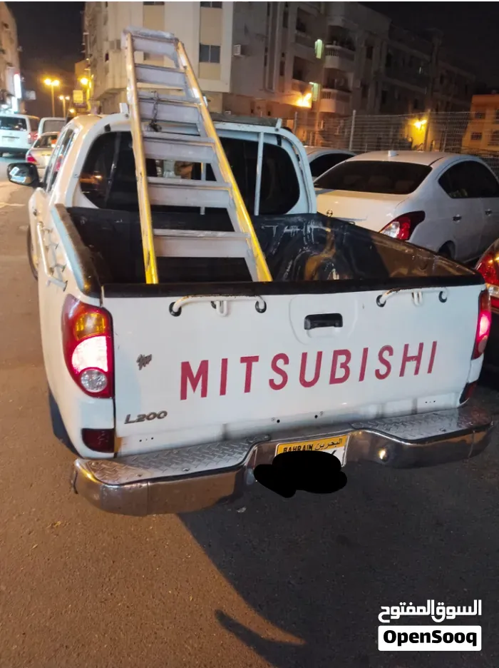 Mitsubishi L200 2009 photo 4
