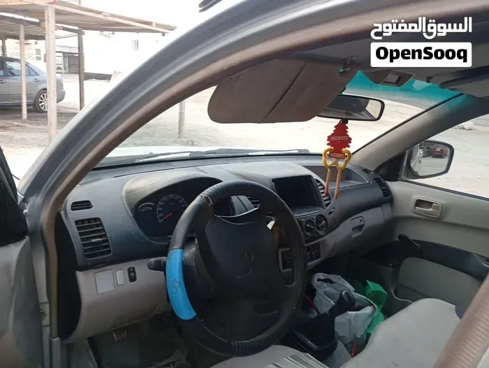 Mitsubishi L200 2009 photo 2