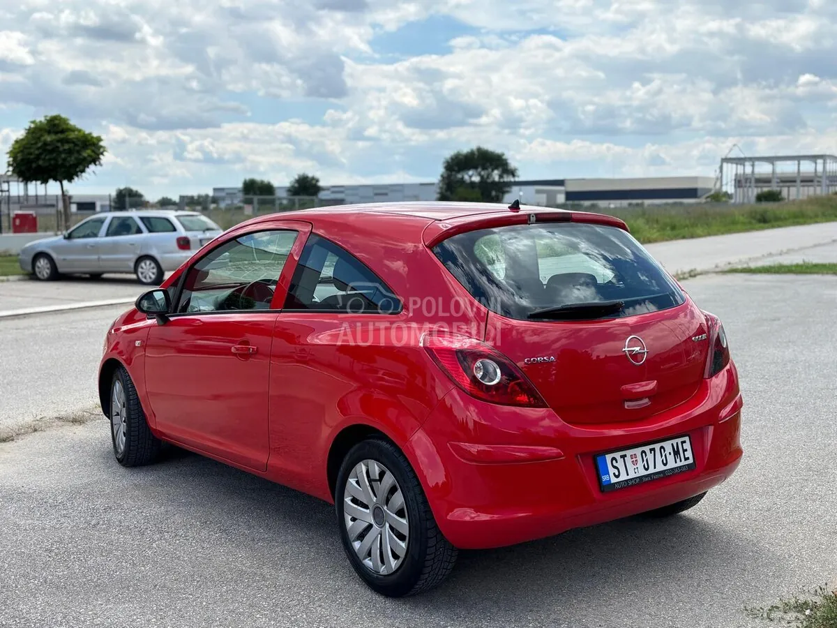 Opel Corsa D 2009 photo 4