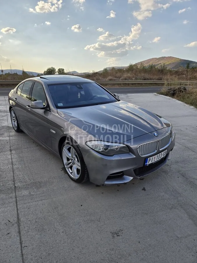 BMW M550 2012 photo 4