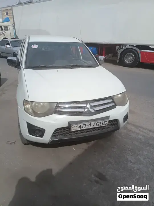 Mitsubishi L200 2013 photo 5