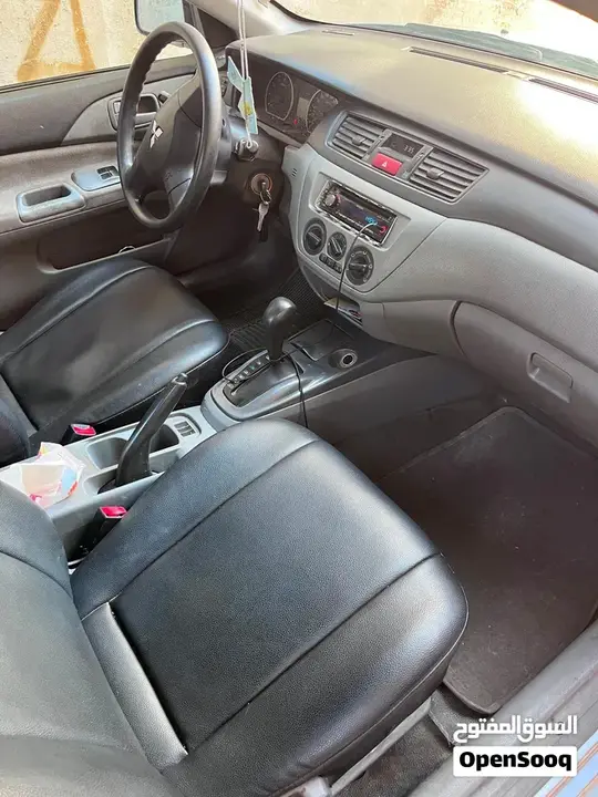 Mitsubishi L200 2013 photo 3
