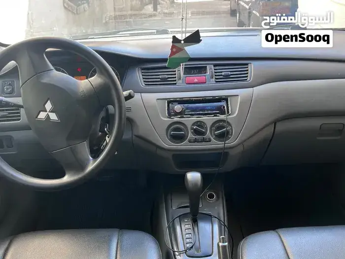 Mitsubishi L200 2013 photo 4