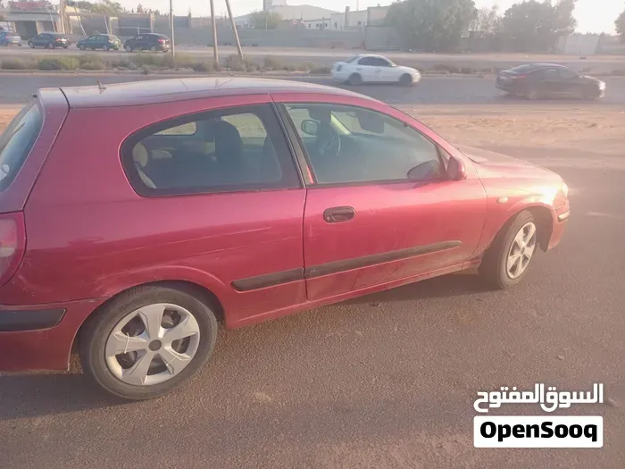 Nissan Almera 2002 photo 3