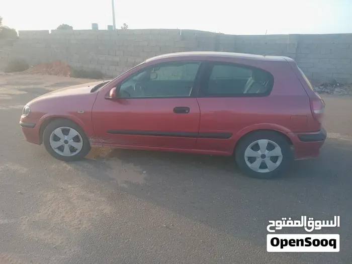 Nissan Almera 2002 photo 2