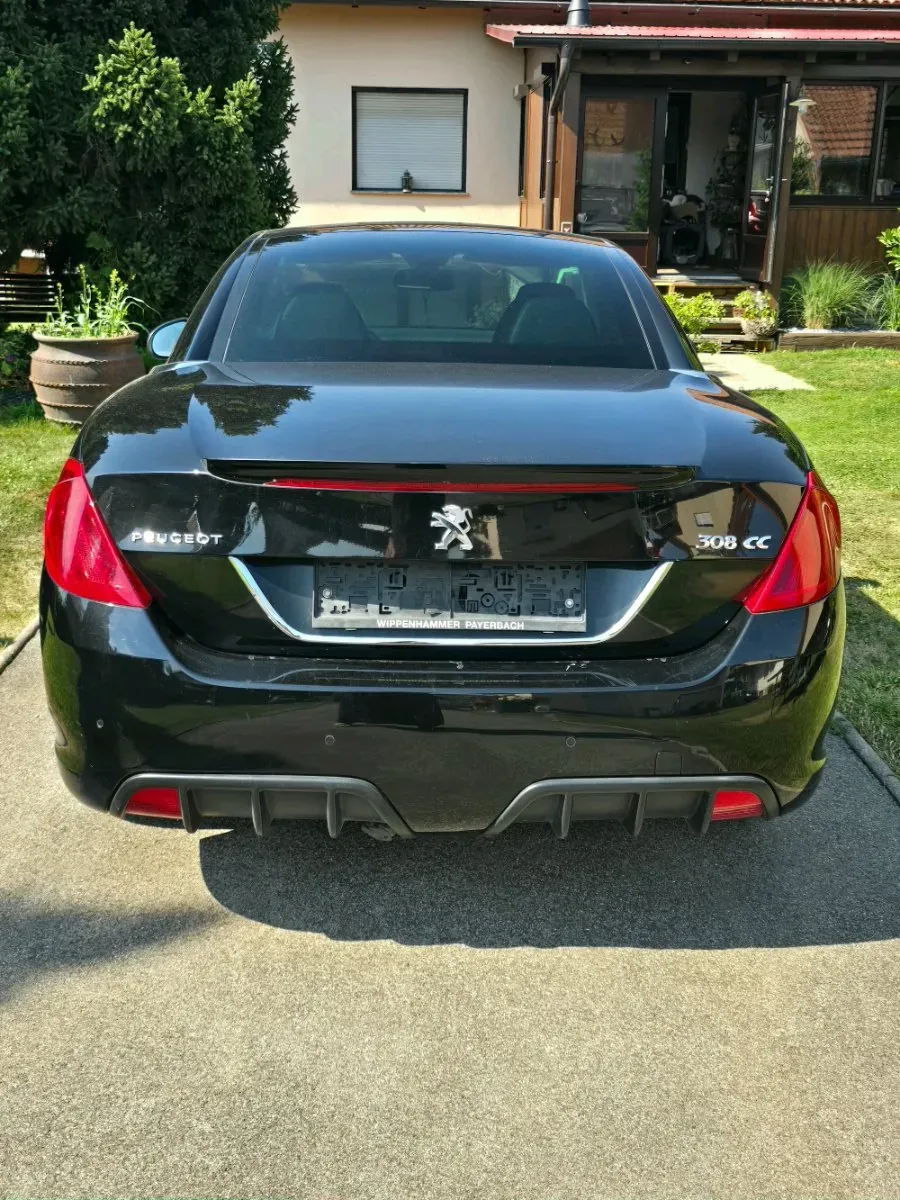 Peugeot 308 2012 photo 2