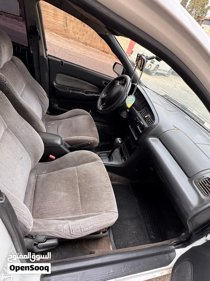Mazda 323 1996 photo 2