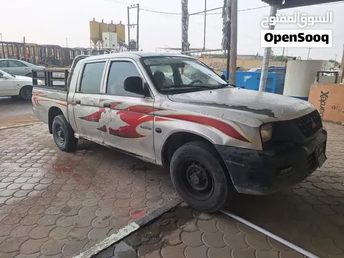 Mitsubishi L200 2004 photo 5